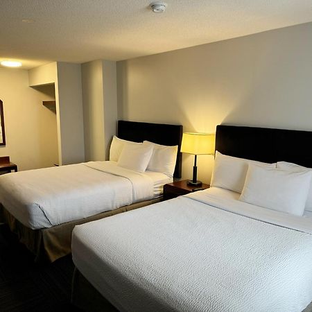 فندق Divya Sutra Plaza And Conference Centre Calgary Airport المظهر الخارجي الصورة
