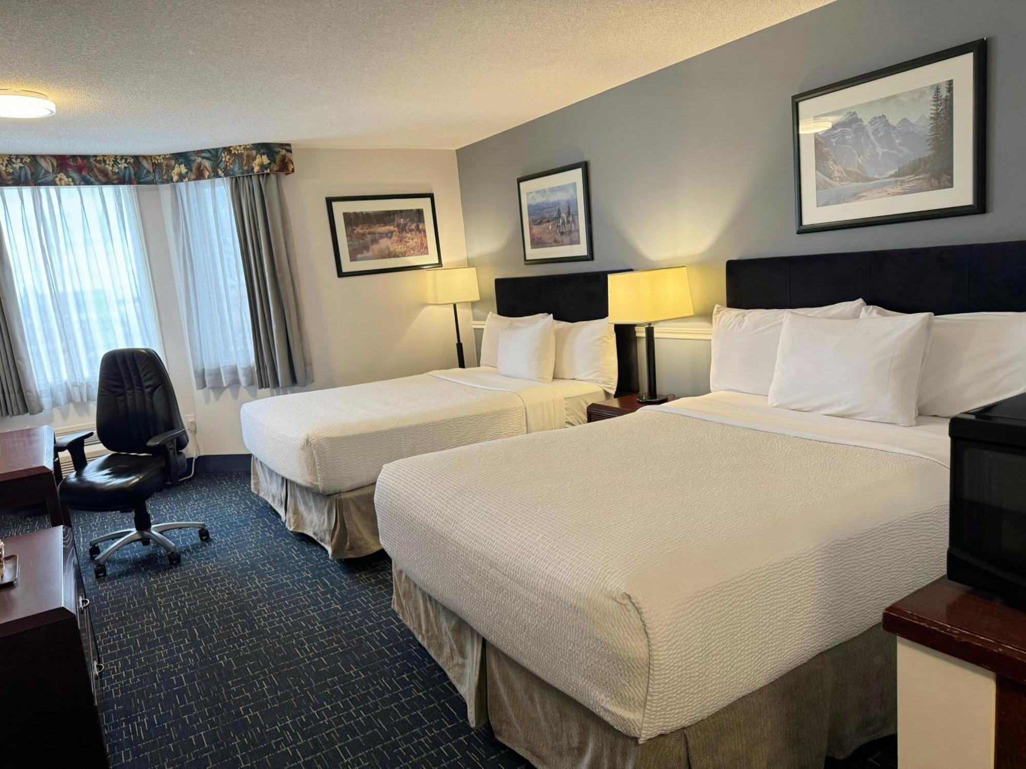فندق Divya Sutra Plaza And Conference Centre Calgary Airport المظهر الخارجي الصورة