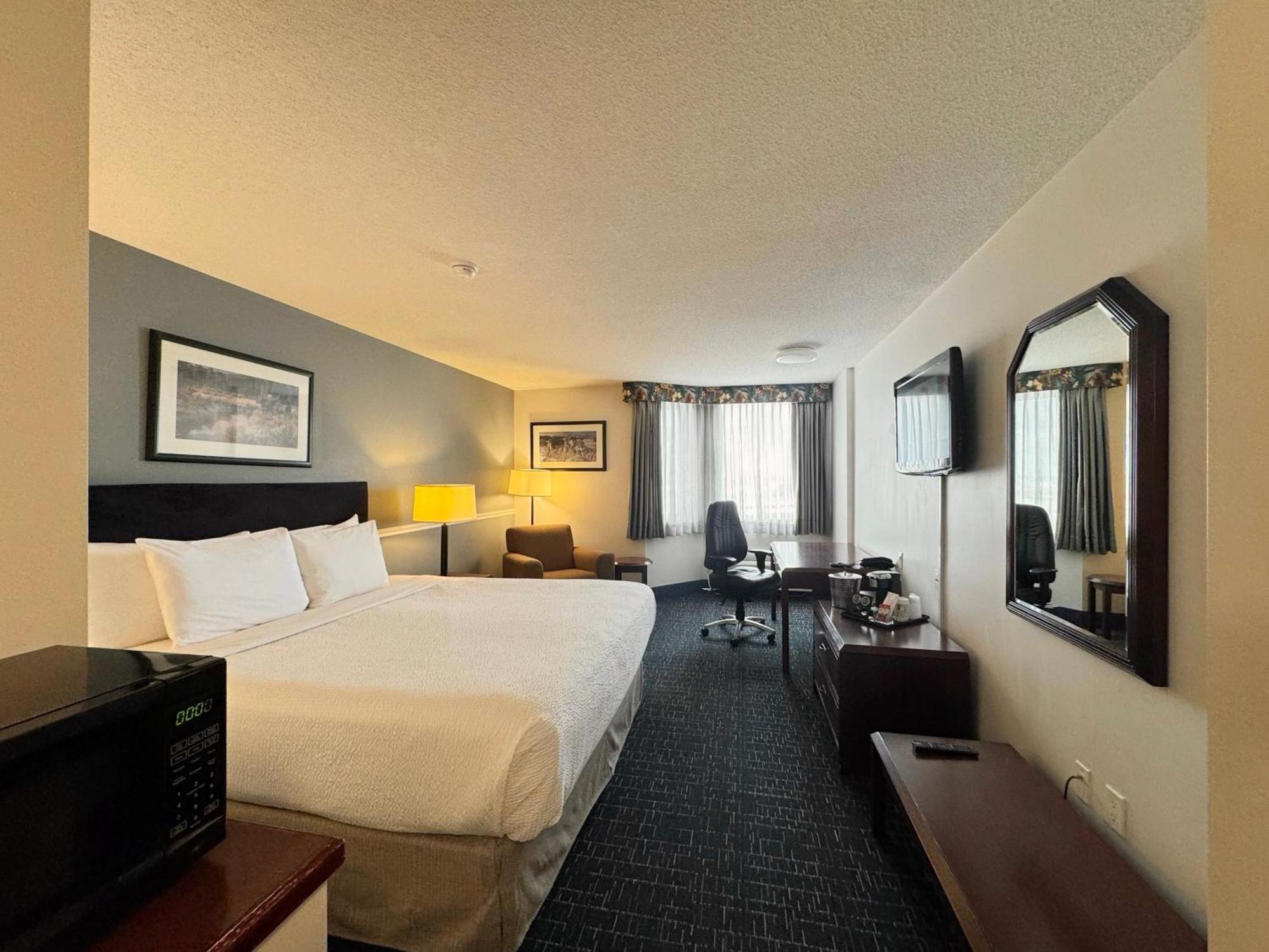 فندق Divya Sutra Plaza And Conference Centre Calgary Airport المظهر الخارجي الصورة