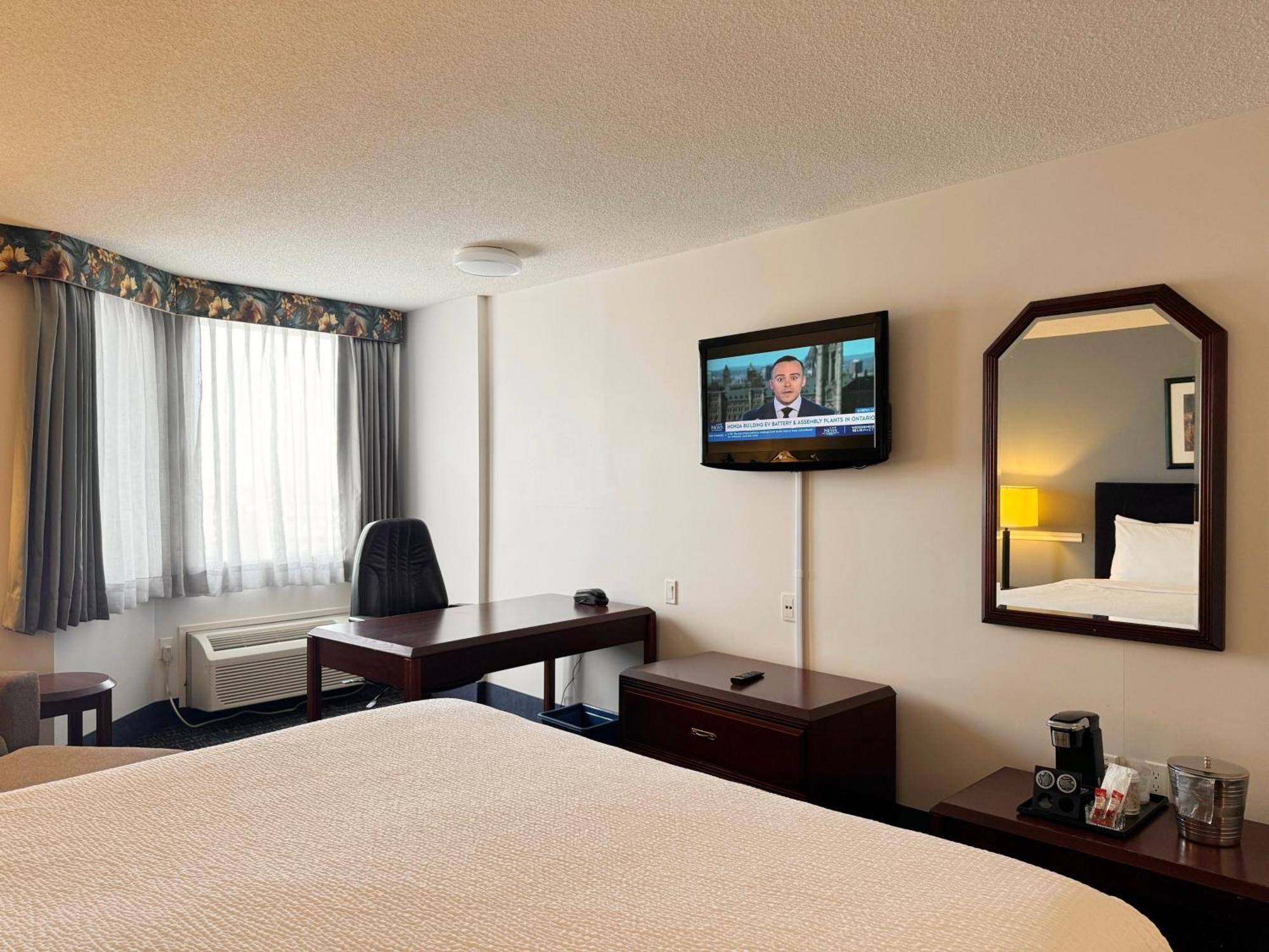 فندق Divya Sutra Plaza And Conference Centre Calgary Airport المظهر الخارجي الصورة