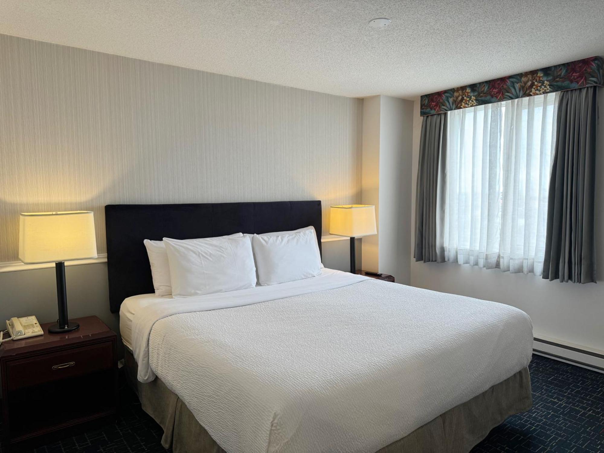 فندق Divya Sutra Plaza And Conference Centre Calgary Airport المظهر الخارجي الصورة