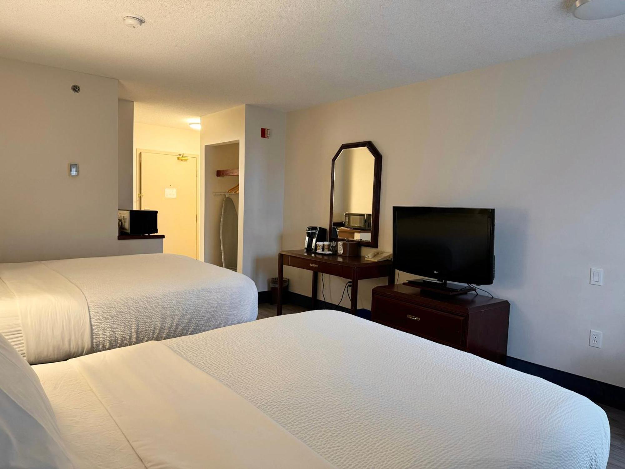 فندق Divya Sutra Plaza And Conference Centre Calgary Airport المظهر الخارجي الصورة